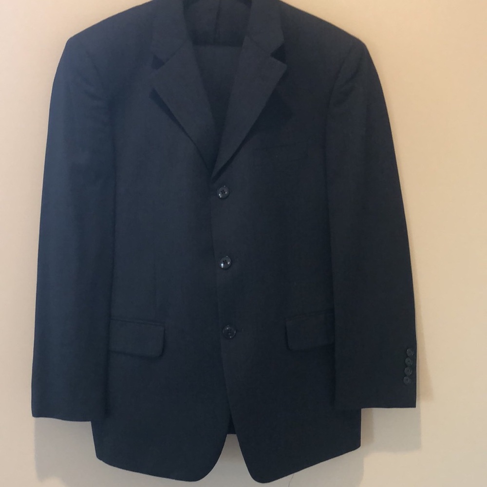 Handsome black suit with tone on tone stripe.